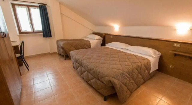 Четырёхместный номер Economy Albergo Della Corte
