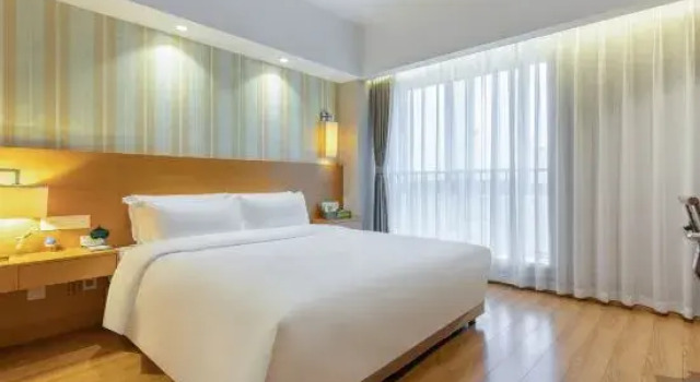 Семейный люкс Yifan Hotel