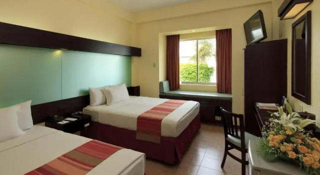Четырёхместный номер Standard Microtel by Wyndham Batangas