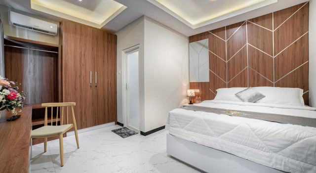 Tree Homestay RedPartner, Rezerwuj Hotel Hotele w Malang z parkingiem, w pobliżu Universitas Brawijaya Malang, Parking