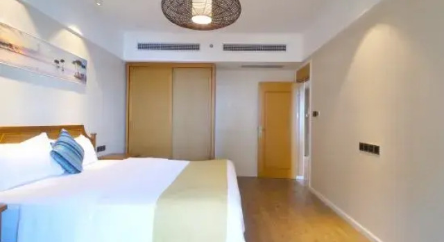 Люкс с 3 комнатами с балконом и с видом на море Surfing Design Meisu with Seaview Surfing in the Huandao Jia Xihai (Wanning Sunac Riyue Bay)