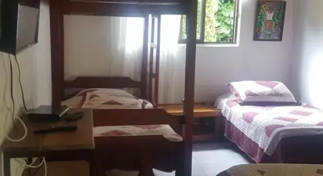 Кровать в общем номере Salento Finca Hotel Mundo Nuevo