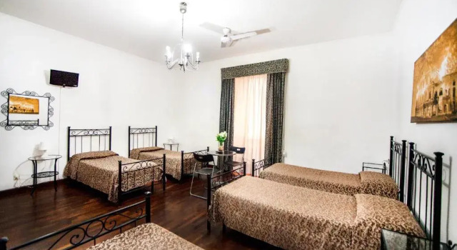 Кровать в общем номере Funny Palace Hostel