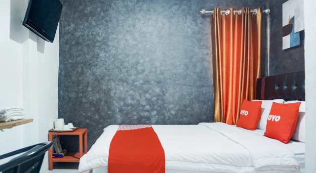 Номер Deluxe Hotel O Bandar Lampung Near Gor Saburai Formerly Omah Anakku
