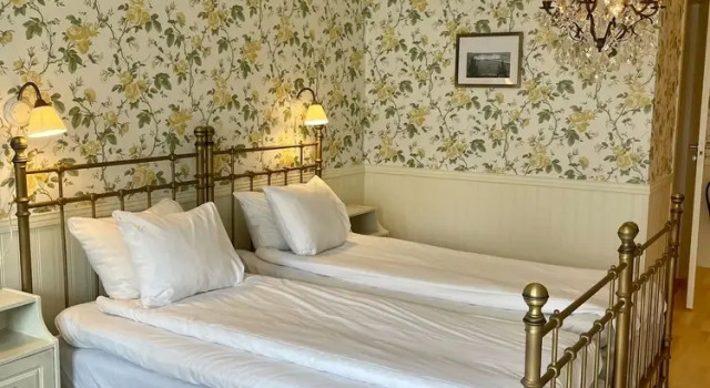 Номер Deluxe Slottsgården Hotell & Restaurang