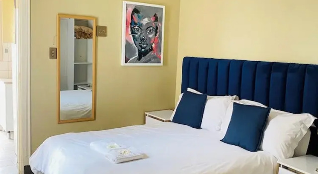 Апартаменты Luxury Henry George Hotel
