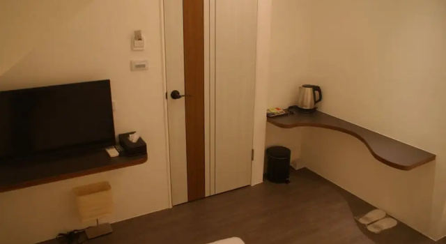 Кровать в общем номере Bai Ji Yi B&B