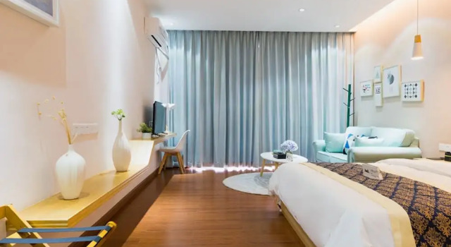 Номер Executive Huizhou Qu Wo Jia Shang Pin Apartment
