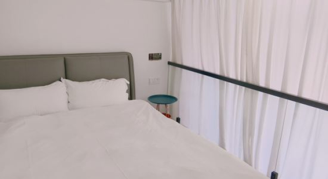 Люкс с 2 комнатами Quwowo Boutique Apartment
