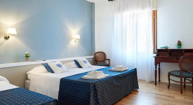Четырёхместный номер Standard Hotel Punta Nord Est