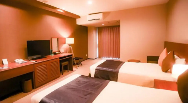 Двухместный номер Deluxe Japanese-Style with Bathroom The Yuinchi Hotel Nanjo