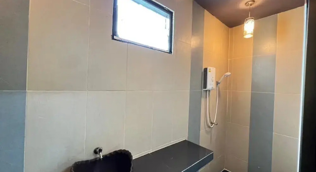 Кровать в общем номере The Green Season Resort