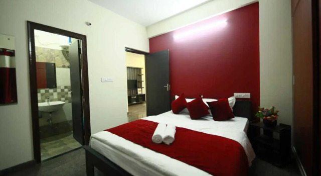 Номер Deluxe Tranquil Orchid Serviced Apartments