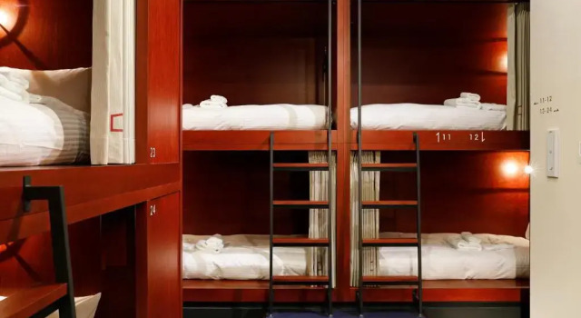 Кровать в общем номере HakoBA Hakodate by THE SHARE HOTELS
