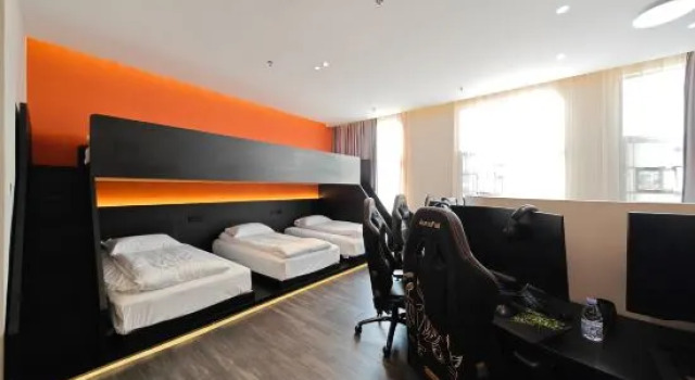 Кровать в общем номере Taikoo E-sports Hotel