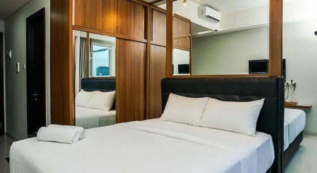 Minimalist Studio Room at Puri Mansion Apartment