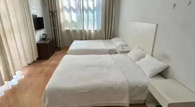 Zhumadian Tianyi Homestay, Rezervovat Hotel Zhumadian Henan
