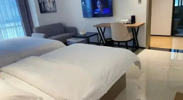 Люкс Executive с 2 комнатами Najia Yunjv Hotel (Mengzi Nanhu Park)