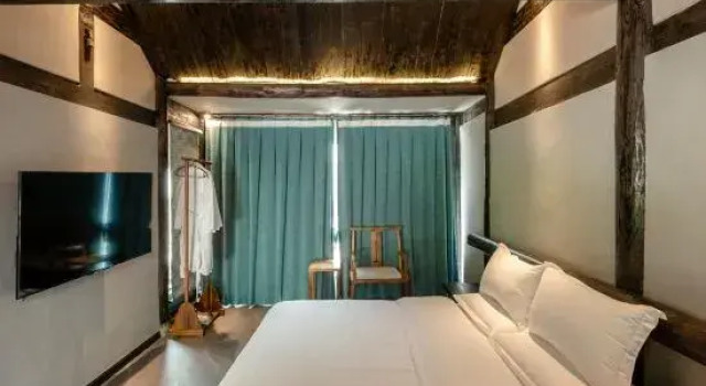 Люкс Emeishan Liangchu Tiansi Tang Homestay