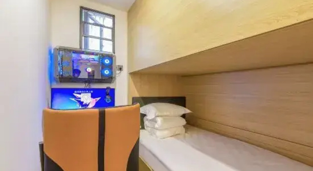 Кровать в общем номере Hard rock E-sport Wisdom Hotel