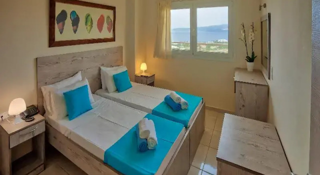 Четырёхместный семейный номер Standard с балконом Elounda Residence Resort & Waterpark
