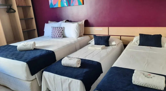 Номер Classic Hotel Rosa da Ilha Guaruja - 80m do mar, 02 piscinas, sala de jogos, brinquedão de percurso para crianças