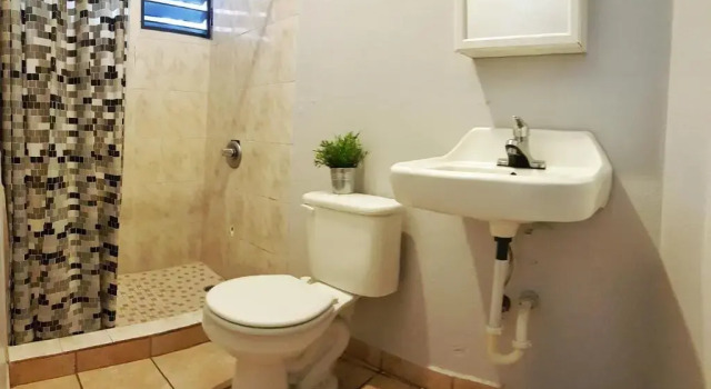 Кровать в общем номере Casa Santurce