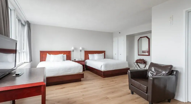 Süper dört kişilik oda Hotel les Suites Labelle