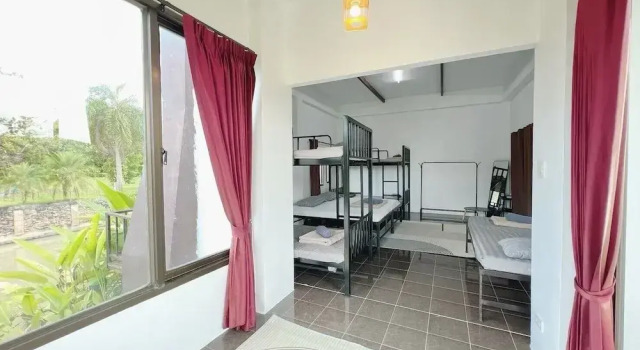 Кровать в общем номере The Green Season Resort