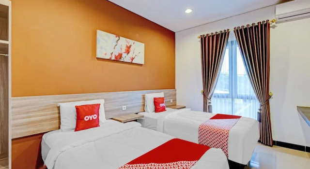 Deluxe Twin room Super OYO Capital O 90497 Navaya Guest House