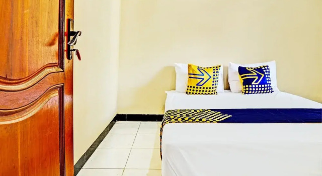 Номер Standard OYO 93107 Homestay H Syarif Syariah – Bandar Gresik