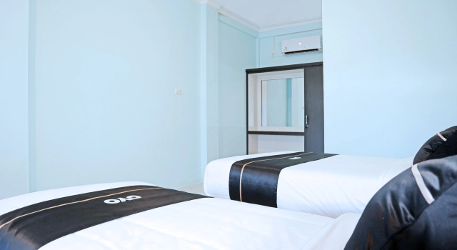 Трёхместный люкс OYO 3114 Homestay Dalimo
