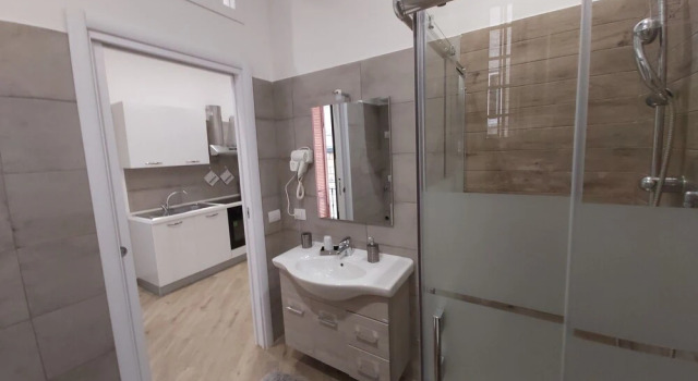 Апартаменты с 2 комнатами с балконом Dormire a Napoli Centro Holiday House
