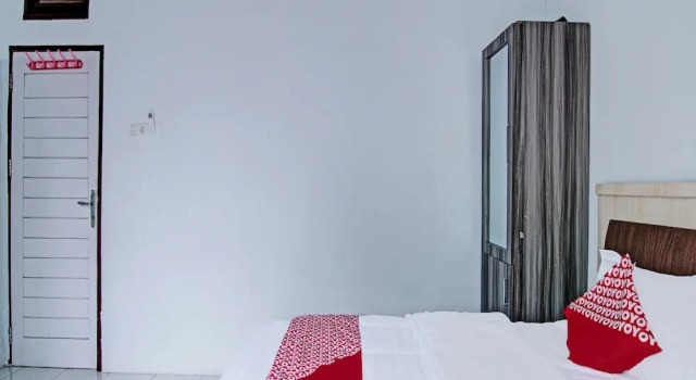 Номер Deluxe OYO 92047 Penginapan Arfi Syariah