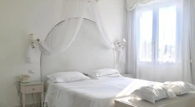 Четырёхместный номер Deluxe Hotel Al Cavallino Bianco