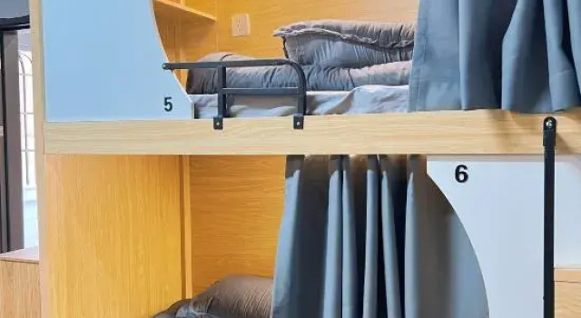 Кровать в общем номере Qingyu Youth Hostel
