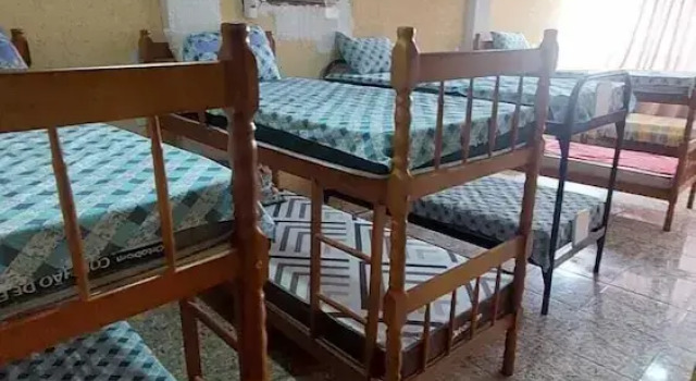 Кровать в общем номере Hostel Bom e Familiar