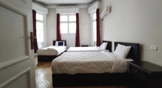 Кровать в общем номере (мужской номер) Travelers House Hostel
