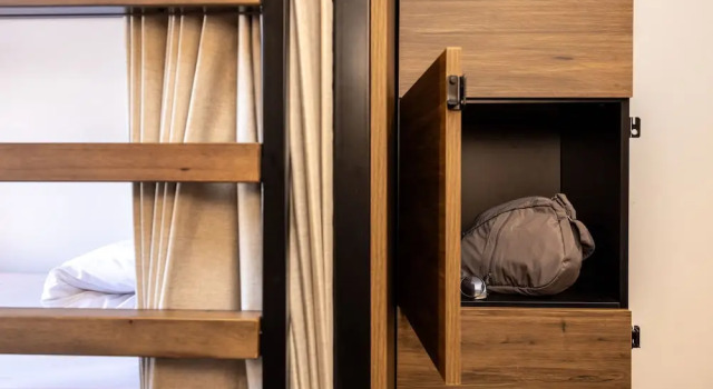 Кровать в общем номере Haka House Rotorua