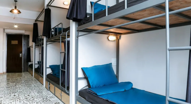 Кровать в общем номере Sapa Signature Inn