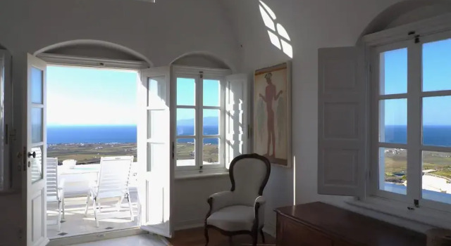 Апартаменты с видом на море The Palm Rock Finikia Santorini