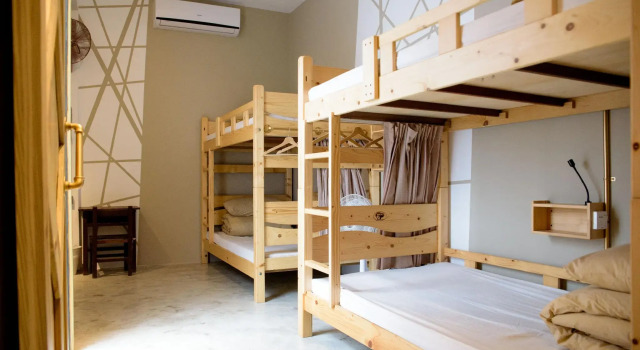 Кровать в общем номере 框框背包客棧 Kuang Kuang Hostel