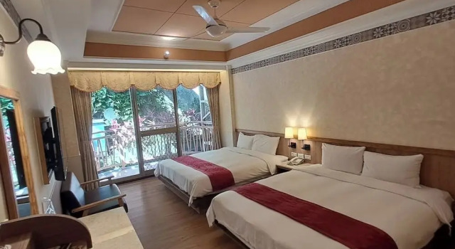 Трёхместный номер Standard Ku Kuan Hotel