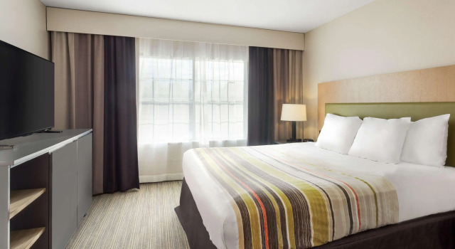 Country Inn & Suites by Radisson, Jackson-Airport, MS, Varaa Hotelli Hotellit New England uima-altaalla, Uima-allas