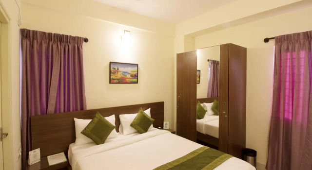 Treebo Trend Mel's Suites Indiranagar, Réserver Hôtel Hôtels à Karnataka avec parking, Parking
