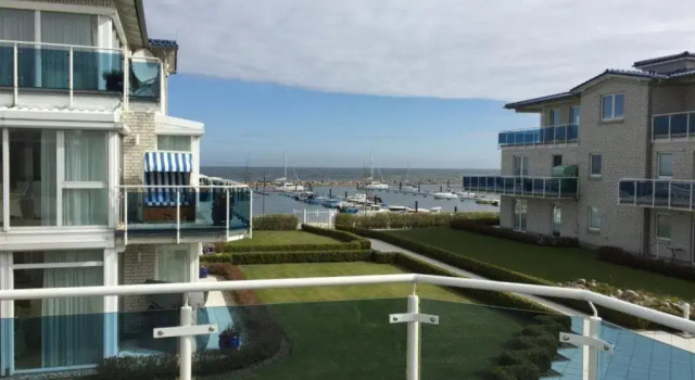 Appartementanlage Residenz Am Yachthafen, Забронировать Отель Отели Кюлунгсборн с парковкой, рядом с Pier, Парковка