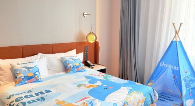 Семейная капсула Deluxe Qingdao West Coast Hilton Homewood Hotel