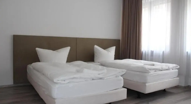 Кровать в общем номере Slamba Hostel