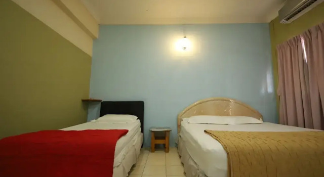 Трёхместный номер Standard OYO Homes 90575 C.k Bahau Homestay