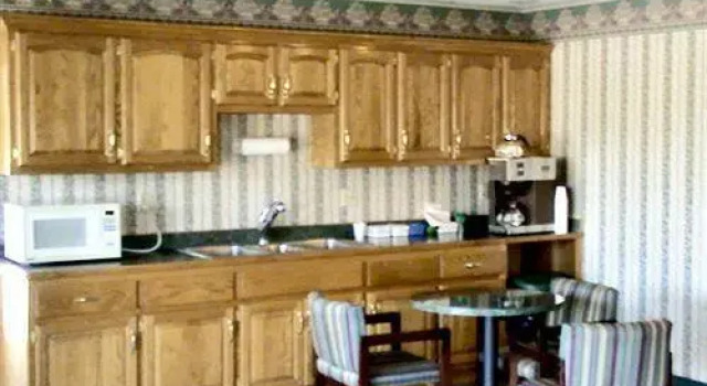 Кровать в общем номере Highland Inn Peculiar